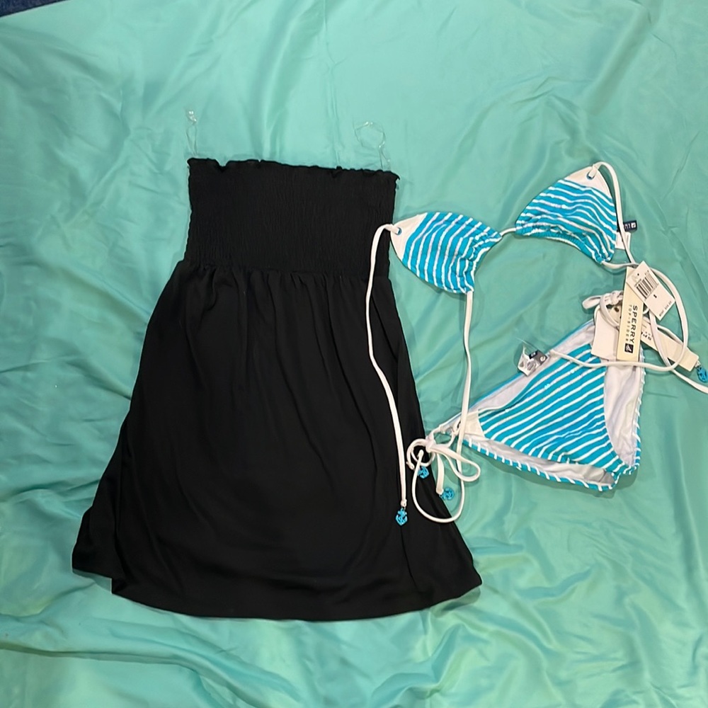 speedy bathing suit and a black cover up